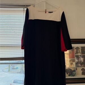 Elegant Black and White Dress with Red Accents